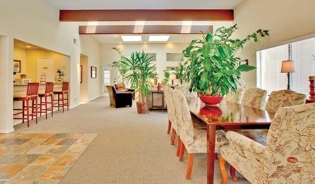 1 bedroom Apartment - features a private patio/balcony dishwasher. Carport parking!
