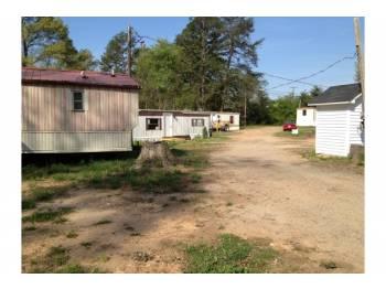? ? ? 8 mobile homes on nearly 2 acres nestled in Crowders Mtn