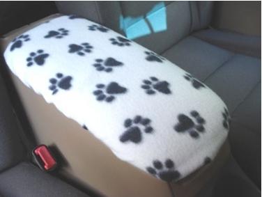 ☆ ☆ ☆ ☆ DOGGIE PAWS auto console covers a must have.