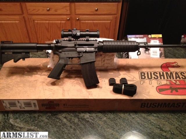 Bushmaster AR15 Carbon 15, Brand New in Box. never fired, comes with everything included in box, 5 mags and 100rds of 223