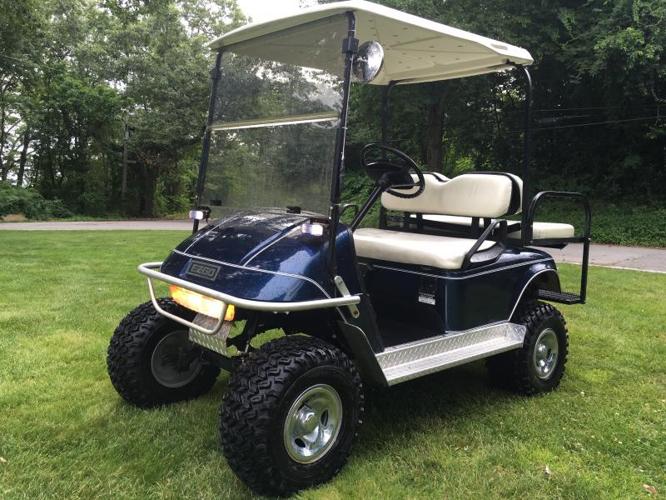 Custom EZGO Lifted Golf Cart - Blue