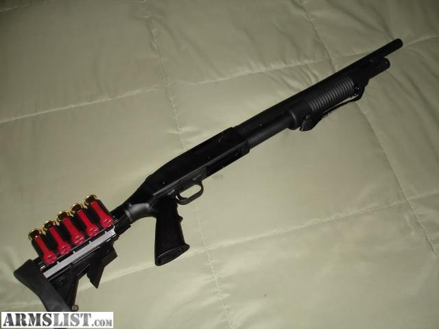 Mossberg 500 Persuader (or comparable)