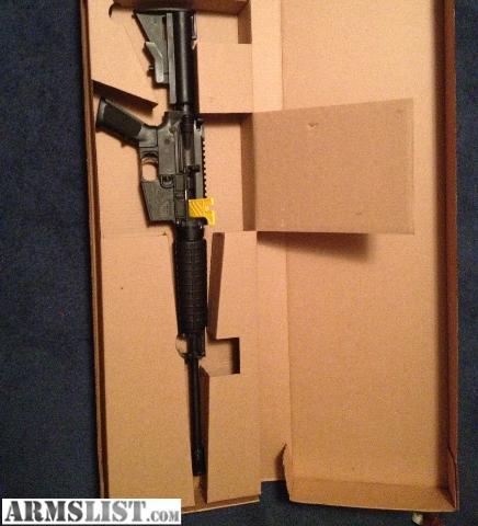 New Bushmaster AR15 Carbon 15 in Box with 11 New 30rd Mags