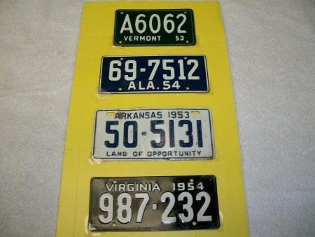 Set of four bicycle license plates from the 50's