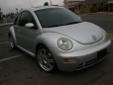 01 vw beetle 1.8L turbo automatic 78,000 Miles, great on gas, blk leather in silver color out, clean inside and out, sunroof, power windows, power locks, runs great please call or text 623-- 76O-- 4862 *dont forget to look at pictures