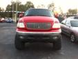 2002 Ford F-150 Lariat Crew Cab Red with Tan Leather Interior
Power Windows and Locks, Power Seats, Aftermarket AM/FM Stereo CD, Climate Control, Cruise, Tilt, Running Boards, Lift Kit, Off Road Tires, Towing Package and Alloy Wheels
This Ford truck looks