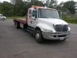 This is a money maker. This truck is fully equipped and completely operable. Great shape for a tow truck and a great price. Heavy Duty Hydraulic Winch on rollback w 50 ft cable. 21 Foot All aluminum durable diamond plate rollback body. Cab is roomy and