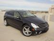 2009 Mercedes Benz R-Class R350, V6, 7-spd Automatic Transmission, STK #094548. Charcoal Gray ext over Tan leather int. This non smoking car has 45,706 miles with remaining factory warranty and loaded with options including Premium Pkg, Navigation,