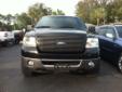 2006 Ford F150 Extended Cab 4WD Black with Black Leather Interior
Power Windows and Locks, Power Seats, AM/FM Stereo CD, Climate Control, Cruise, Tilt, Towing Package, Custome Alloy Wheels and Four-Wheel Drive
This Ford truck LOOKS AMAZING!!! It has been