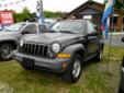 Super clean 2006 Jeep Liberty Sport has a 6 cylinder engine, roof rack, power windows & locks, cruise & more! Really Nice!