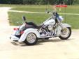 2007 Harley Davidson FLSTC Heritage Softail Trike
Classic set up as trike, 3500 mile and lots of extras!
The Heritage Softail Classic comes complete with a detachable windshield, passenger floorboards, and comfy backrest to go with wide fenders and
