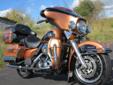 Well accessorized, local 1 owner 105th Anniversary Ultra Classic, with ABS brakes.
A beautiful 105th Anniversary Ultra, finished in Anniversary Copper Pearl & Vivid Black. This machine has 25,681 miles, and comes well equipped with:
Brembo ABS Antilock