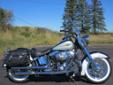 Very clean, one owner Softail Deluxe, in a limited Factory custom finish!
A well accessorized Deluxe, with 26,887 miles that comes finished in a limited Factory custom, Big Purple Flake & Brilliant Silver paint scheme. This exceptional machine also comes