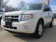 30k miles, Automatic***NICE White Suede Escape XLT with Pearl Beige Leather and Heated Seat! No damage of any kind inside or out. Very Clean! Rides like a New one. No smells, No nothing. Factory Warranty. Don't miss it. See more Nice Escape's at