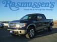 Â .
Â 
2010 Ford F-150
$26000
Call 800-732-1310
Rasmussen Ford
800-732-1310
1620 North Lake Avenue,
Storm Lake, IA 50588
Our 2010 Ford F-150 XLT SuperCab can be classified as one of the "Ford Tough" truck members. This SuperCab has quad doors and a second