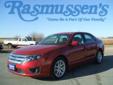 Â .
Â 
2010 Ford Fusion
$20000
Call 712-732-1310
Rasmussen Ford
712-732-1310
1620 North Lake Avenue,
Storm Lake, IA 50588
Our 2010 Ford Fusion SEL offers fuel efficiency, a spacious cabin, ride comfort, and better-than-adequate handling. This car draws