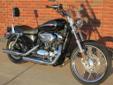 A local one owner, low mileage Sportster 1200 Custom, with just 3,301 miles!
A super-clean, almost new Sportster Custom, finished in a beautiful Vivid Black, that comes nicely accessorized with:
Detachable Windshield
Passenger Backrest
Screamin' Eagle