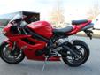 .
2010 Triumph DAYTONA 675 There's no doubting what this bike has been built for!
$8995
Call (860) 341-5706 ext. 1033
Engine Type: Liquid-cooled, 12 valve, DOHC, in.-line 3-cylinder
Displacement: 675cc
Bore and Stroke: 74 x 52.3 mm
Cooling: Liquid