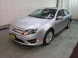 Price: $22998
Mileage: 10,534 mi
Fuel: Electric And Gas Hybrid, 41/36 mpg
Engine Size: I4, 2.5L L
The well-rounded 2011 Ford Fusion is one of our top picks for a midsize family sedan.? Spacious interior, engaging handling, comfortable ride, excellent Ford