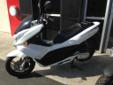 .
2011 Honda PCXâ Scooters
$2299
Call (562) 200-0513 ext. 1363
SoCal Honda Powersports
(562) 200-0513 ext. 1363
2055 E 223RD St.,
Carson, Ca 90810
2011 HONDA PCX125 WHITE LOW MILES. 125 cubic centimeters of Pure Sport Fun
The all-new Honda PCXâ is your