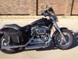 .
2013 Harley-Davidson Sportster 1200 Custom
$9495
Call (940) 202-7925 ext. 399
American Eagle Harley-Davidson
(940) 202-7925 ext. 399
5920 South I-35 E,
Corinth, TX 76210
Nice Bike Saddle Bags Windshield.The ultimate wide-shouldered cruiser.  The 2013