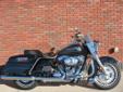 A new 2013 Road King 103, with Cruise, finished in a sharp Midnight Pearl!
M.S.R.P. Â  $18,419
The Road King is a no-nonsense old school touring rig that looks as good as it feels!
Built around Harley's touring platform, the Road King has the ability to