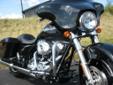 New 2013 FLHX Street Glide, finished in a stealth Midnight Pearl!
M.S.R.P. Â  $21,799
The new Midnight Pearl paint on this Street Glide is a stealth finish that keeps its cool in the shadows and looses it in the sun. Come in and get your face on this