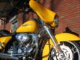 New 2013 FLHX Street Glide, covered in a brilliant Chrome Yellow Pearl finish!
M.S.R.P. Â  $21,799
With an acre of Chrome Yellow paint covering this incredible machine, you can leave the Hi-Vis gear in the closet; this Street Glide can be seen halfway to
