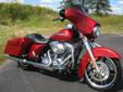 New 2013 FLHX Street Glide, finished in a brilliant Ember Red Sunglo!
M.S.R.P. Â  $21,799
Built on Harley-Davidson's legendary Touring Chassis, a Street Glide packages the touring essentials into an iconic, stripped-down piece of street iron that begs to