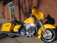 New 2013 FLHX Street Glide, covered in a brilliant Chrome Yellow Pearl finish!
M.S.R.P. Â  $20,309
With an acre of Chrome Yellow paint covering this incredible machine, you can leave the Hi-Vis gear in the closet; this Street Glide can be seen from halfway