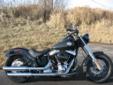 A new 2013 Softail Slim 103. The bare essentials have never been this exciting!
M.S.R.P. Â  $15,699
A minimalist, low and narrow old-school Bobber, in a classic Vivid Black finish. Featuring 103 cubic inches of Twin Cam torque, classic retro style, and a