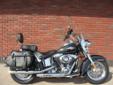 New 2013 Heritage Softail Classic, with ABS & Security, finished in Vivid Black!
M.S.R.P. Â  $18,794
The Heritage Softail is a beautiful machine that is the de facto benchmark for retro touring iron.
This Big Twin tourer comes dressed for the road and