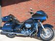 New 2013 Road Glide 103 Ultra Classic, finished in a beautiful Big Blue Pearl!
M.S.R.P. Â  $23,389
The Road Glide Ultra is a shark nose touring machine that is built for carving up crooked two-lane, or devouring endless miles of interstate; whatever suits
