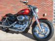New 2013 Sportster 1200 Custom, finished in a brilliant Ember Red Sunglo!
M.S.R.P. Â  $10,814
Build one of these incredible machines to order, or ride it just as it is. Either way the 1200 Custom delivers the Sportster?s classic performance and agility,