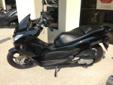 .
2013 Honda PCX150
$3188
Call (859) 898-2909 ext. 421
Lexington Motorsports, LLC
(859) 898-2909 ext. 421
2049 Bryant Road,
Lexington, KY 40509
CALL CATINA @ 859-253-0322 Your Ticket To Ride. Think of the new Honda PCX150 as the do-everything scooter. It