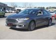 2014 Ford Fusion Titanium - $19,900
HUGE PRICE REDUCTION!!!!! LIQUIDATION EVENT! TAKE ADVANTAGE NOW WHILE THEY LAST!!!!!!, Day/Night Lever, Center Arm Rest, Anti-Theft Device(S), Side Air Bag System, Dual Air Bags, Multi-Function Steering Wheel, Traction