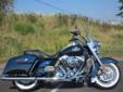 New 2014 FLHR Road King, in Big Blue Pearl & Vivid Black!
M.S.R.P. Â  $19,564
The Road King shares Harley-Davidson's touring platform with the Ultra Classic and Ultra Limited. This machine has the ability to keep you in the saddle all day long, while