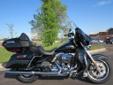New 2014 Ultra Classic, in Vivid Black, with premium 6.5-GT Infotainment!
M.S.R.P. Â  $24,044
The Ultra Classic's exceptionally long run continues full throttle for 2014 with these new upgrades from Harley-Davidson?s Project Rushmore initiative:
New High