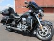 New 2014 Ultra Classic, in Midnight Pear, with premium 6.5-GT Infotainment!
M.S.R.P. Â  $24,634
The Ultra Classic's exceptionally long run continues full throttle for 2014 with these new upgrades from Harley-Davidson?s Project Rushmore initiative:
New High