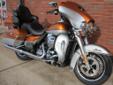 New 2014 Ultra Limited, finished in a Two-Tone Amber Whiskey & Brilliant Silver.
M.S.R.P. Â  $26,939
Harley-Davidson raises the bar on this top-end tourer with their Project Rushmore initiative, which includes these new features for 2014::
New Twin-Cooled?