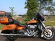 New 2014 Ultra Limited, in an intoxicating Amber Whiskey & Vivid Black finish!
M.S.R.P. Â  $26,939
Harley-Davidson raises the bar on this top-end tourer with these new features from Harley-Davidson?s Project Rushmore initiative:
New Twin-Cooled? Liquid +