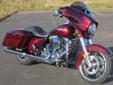 New 2014 Street Glide Special, in an amazing Mysterious Red Sunglo finish!
M.S.R.P. Â  $23,009
This Street Glide Special features Harley's Smart Security System, and these new enhancements for 2014:
High Output Twin Cam 103 Engine
Redesigned Batwing