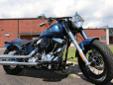 A new 2014 Softail Slim 103, finished in a Factory Custom Daytona Blue Pearl!
M.S.R.P. Â  $16,829
A minimalist, low and narrow old-school Bobber, in an amazing Daytona Blue Pearl finish. Featuring 103 cubic inches of Twin Cam torque, classic retro style,