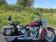 2014, ABS equipped Heritage Softail Classic, finished in Mysterious Red Sunglo!
M.S.R.P. Â  $18,749
The benchmark for retro touring iron is the Heritage Softail Classic. A beautiful machine with a classic profile that comes dressed for the road. Featuring