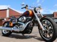 New 2014.5, 103 cubic inch Dyna Low Rider, in Amber Whiskey & Vivid Black!
M.S.R.P. Â  $14,929
The Low Rider is back for mid-2014, with its iconic styling, a brilliant new finish, and a host of upgrades that include:
New 103 Cubic Inch Twin Cam Engine
New