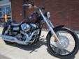 New 2014 Wideglide, with ABS, finished in a Flamed-Out Blackened Cayenne Sunglo!
M.S.R.P. Â  $16,529
This magnificent piece of Custom Iron has been slammed, chopped, raked, and is covered in 50's style Flames over a stunning Blackened Cayenne Sunglo