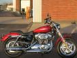 2014 Sportster 1200 Custom, in a brilliant new Candy Orange finish!
M.S.R.P. Â  $10,964
The 2014 Sportster 1200 Custom retains the Sportster's classic performance and agility, while maintaining the wide, beefy stature of a custom heavyweight cruiser.
If