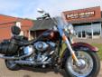 Heritage Softail Classic, with ABS, in Mysterious Red & Blackened Cayenne Sunglo!
M.S.R.P. Â  $19,099
The standard in retro touring iron is the Heritage Softail Classic. A beautiful machine that is recognized around the world for its iconic styling, ease