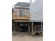 Two-story condo with deeded deep water boat slip, (no sail boats) private fishing pier and beach with gazebo. End unit with covered parking for two vehicles. Two bedrooms, two baths, living room, dining room, wood burning fireplace, two ceiling fans, w/w