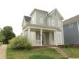 A wraparound from porch welcomes you to this charming 3-bedroom, 2.5-bath home with Victorian accents on a corner lot in desirable Monteith Park. The entry with hardwood floors opens to a living room with French doors and heavy crown molding, also perfect